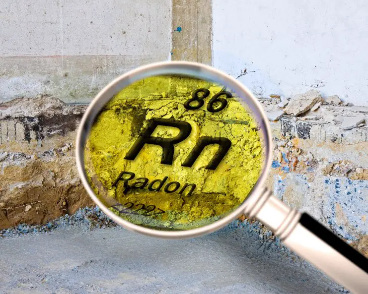 A magnifying glass hovers over a crumbling wall inside a building and highlights the word "Radon" in yellow.