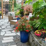 How To Blend Tropical Landscaping With Practical Hardscaping